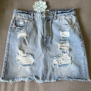 Super cute distressed, jean skirt